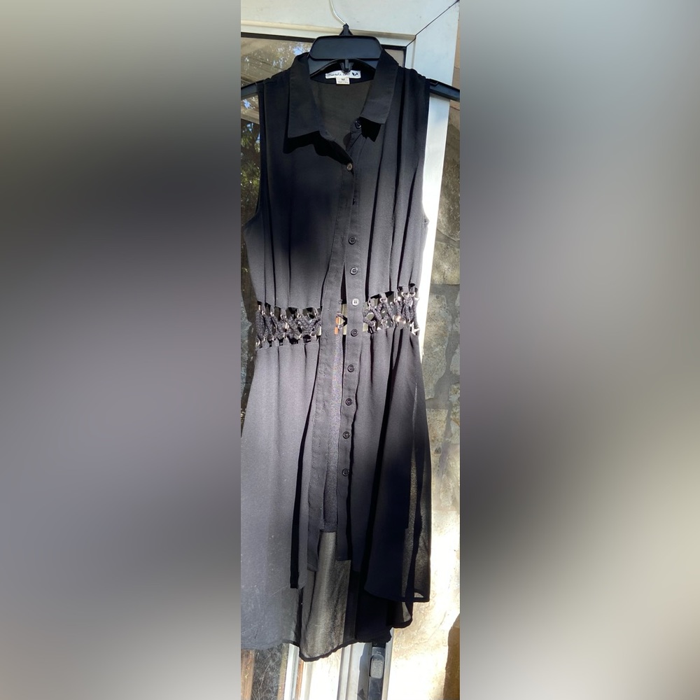 Womens unique long shirt. Rope like see through waist line. Size Medium